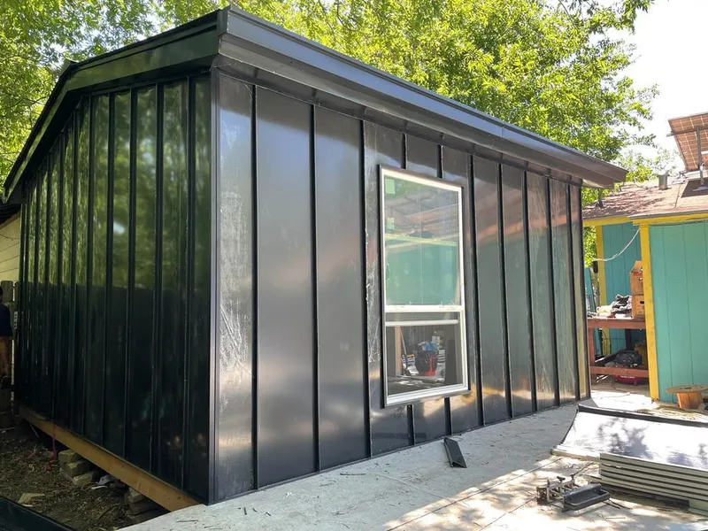 Black standing seam metal wall panels for Metal Roof Installation in Waite Park