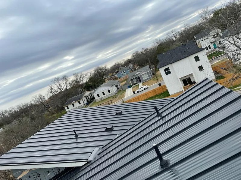 Standing seam metal roof panels with vents for Skylight Repair in Waite Park